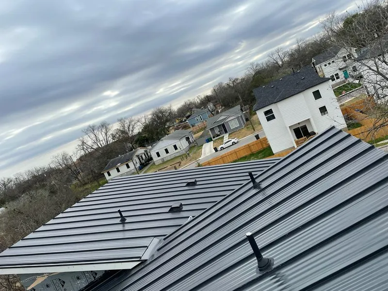 Standing seam metal roof panels with vents for Skylight Repair in West Livingston